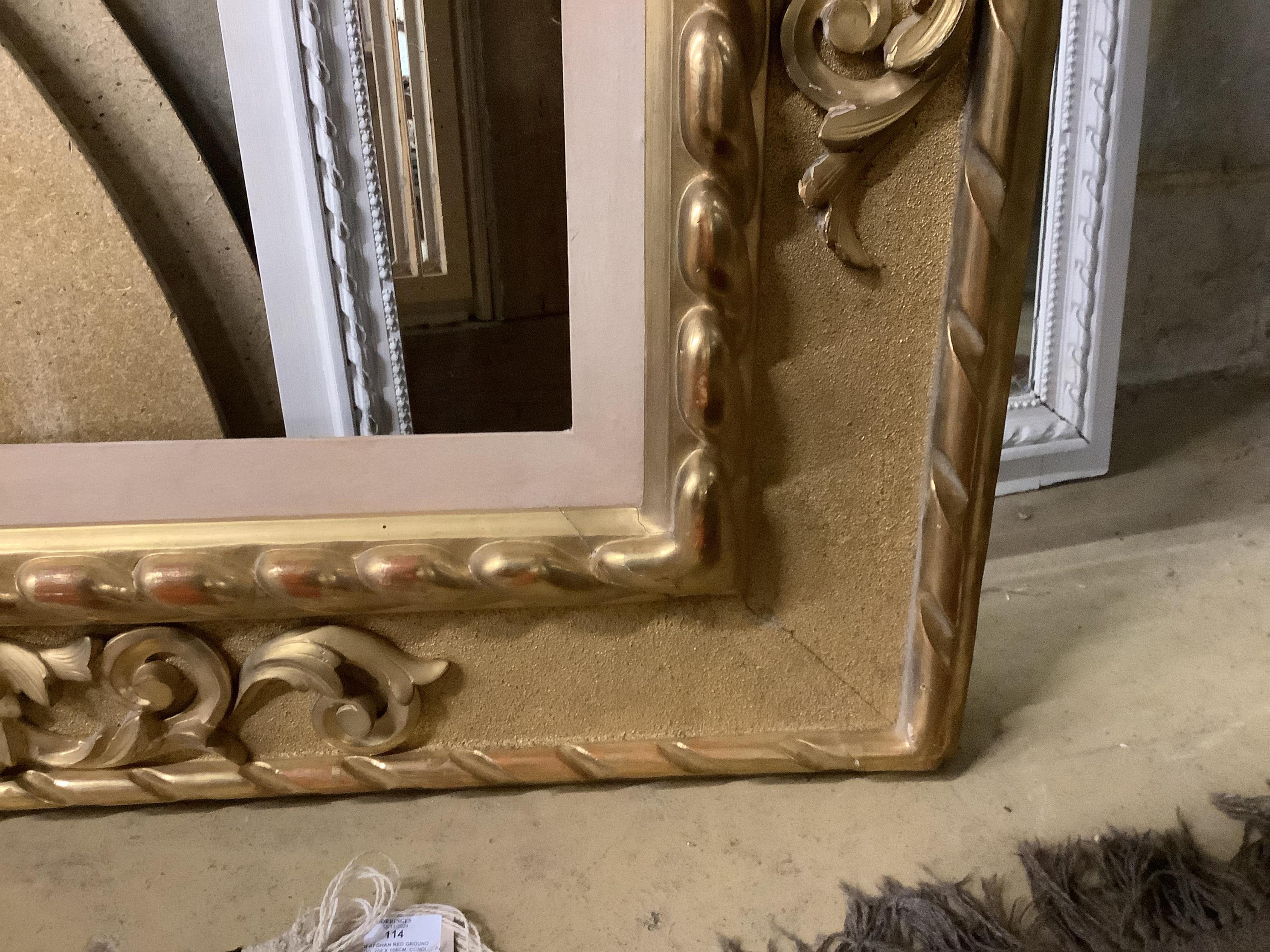 A rectangular giltwood and composition frame, width 142cm, height 180cm. Condition - good